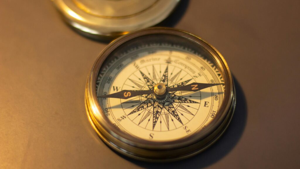 Close-up of a vintage brass compass, symbolizing the guidance and direction provided in this personal development guide