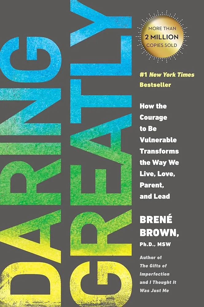 The book cover of "Daring Greatly" by Brené Brown, a must-read book on vulnerability and courage